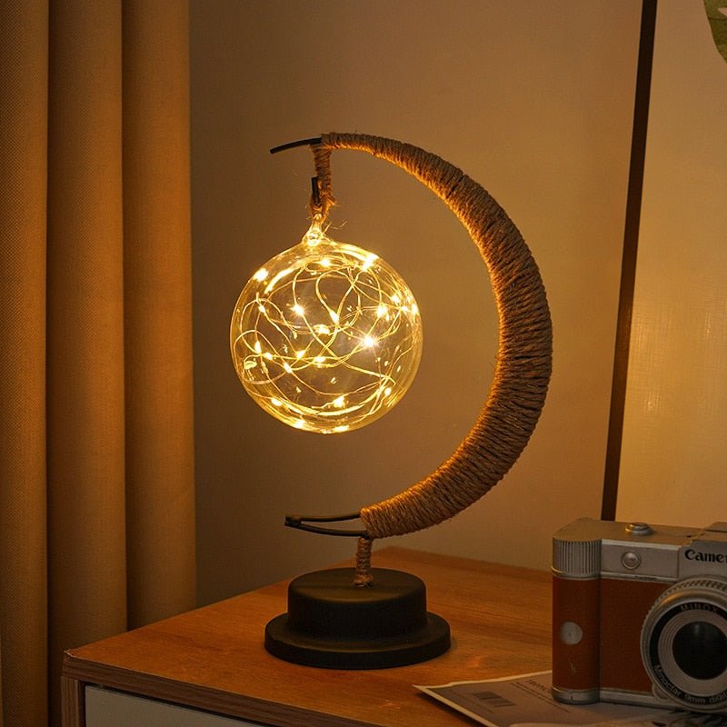 Table Lamp - Suspended Globe with Rope Wrapped Crescent Stand